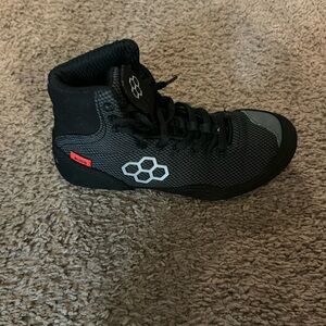 RUDIS size 3 wrestling shoe son attempted to put on 1nc but to small never worn